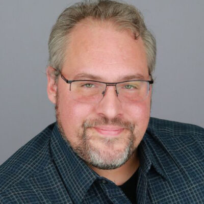 A headshot of James Abbey